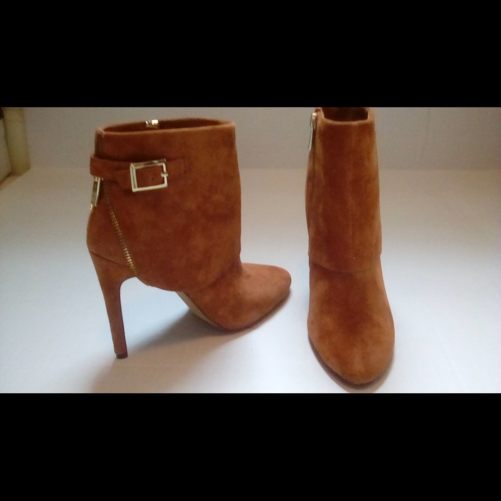 Jessica Simpson mid-rise suede tan heel boots.